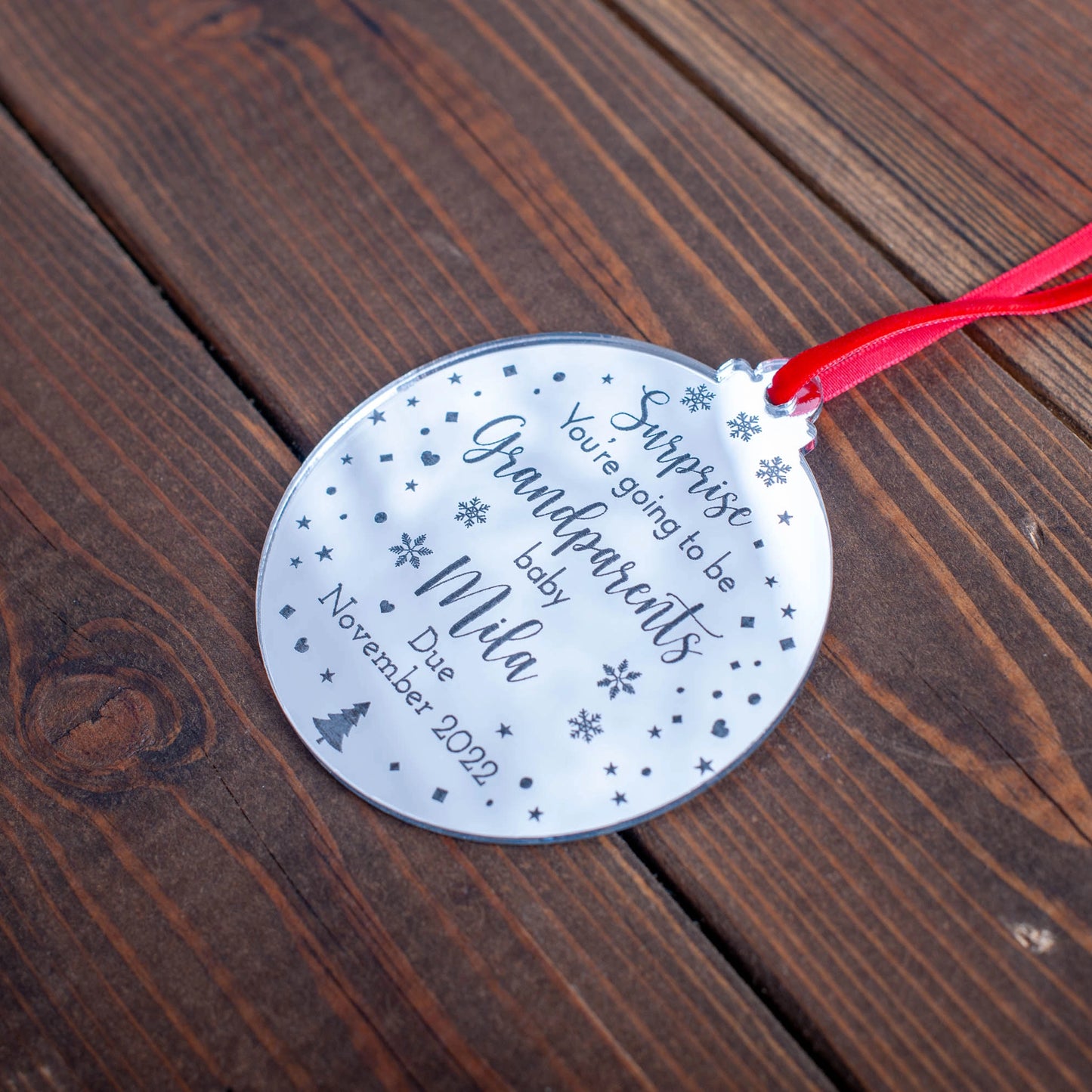 Personalised Christmas ornament revealing pregnancy news in silver mirror finish
