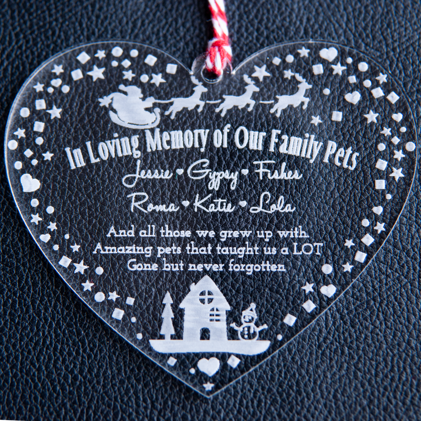 Custom engraved heart-shaped pet remembrance decoration with ribbon