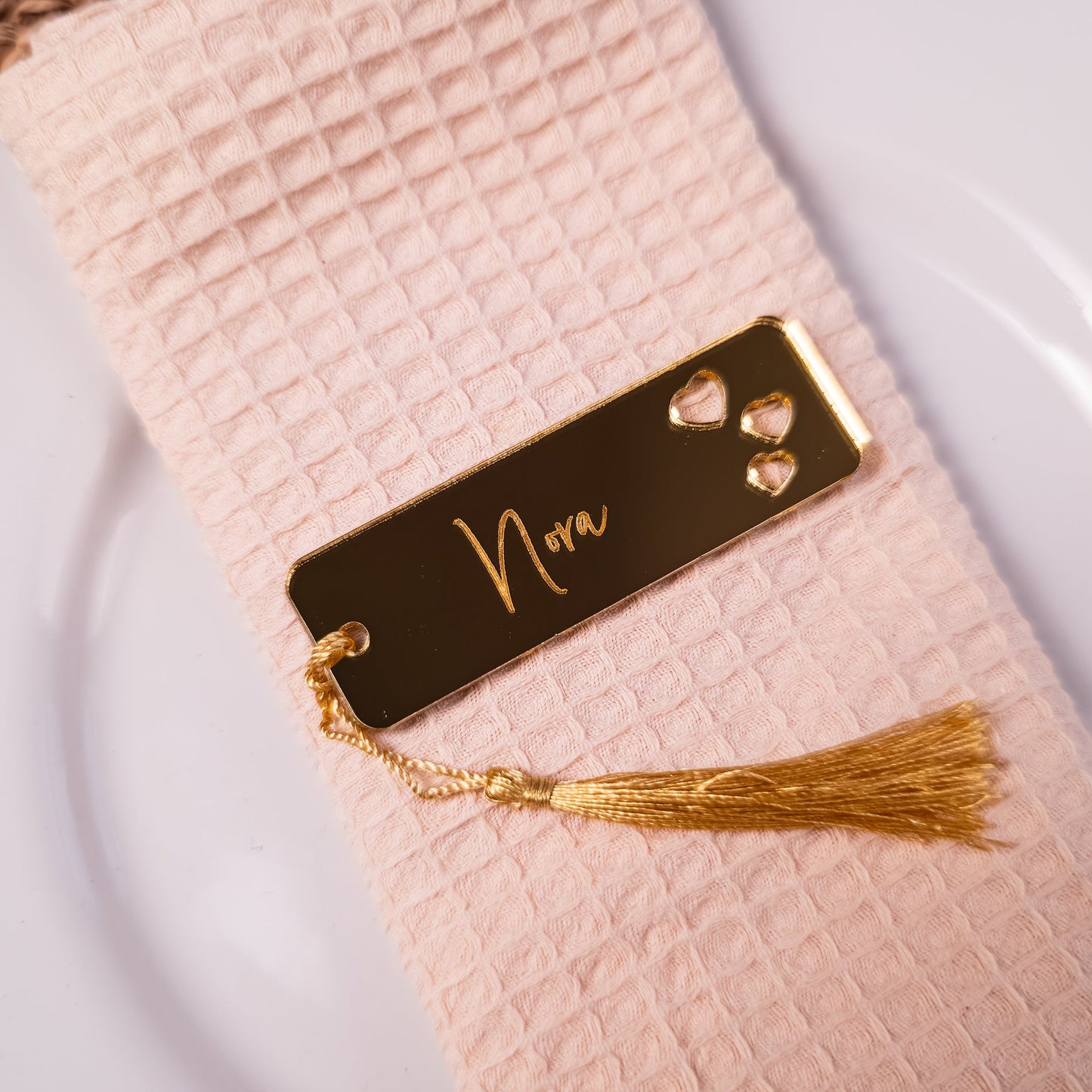 Elegant place card with heart detail for romantic wedding reception