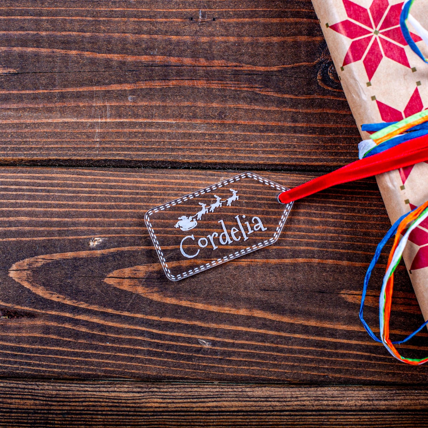 Minimalist transparent acrylic Christmas tag with engraving