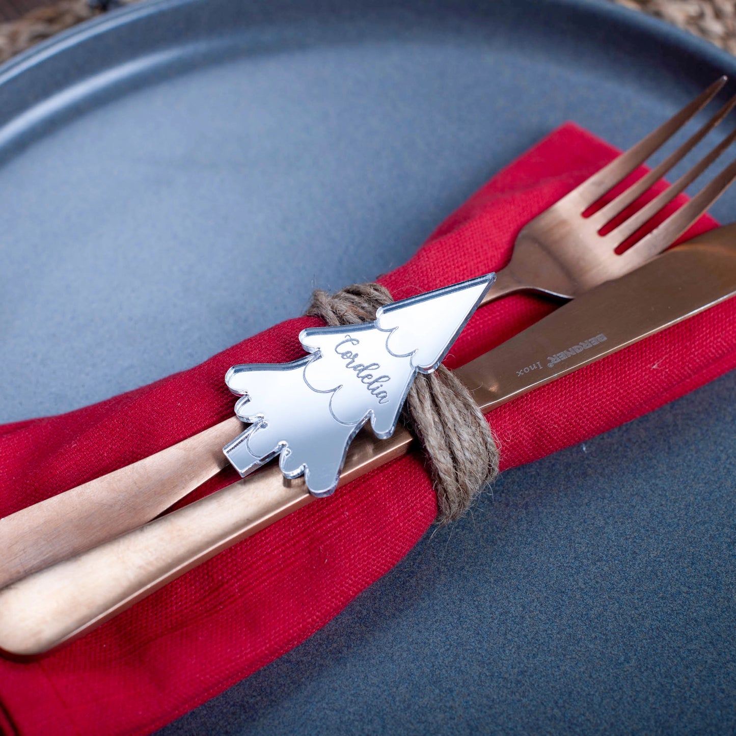 Silver mirror wedding place card shaped like a Christmas tree