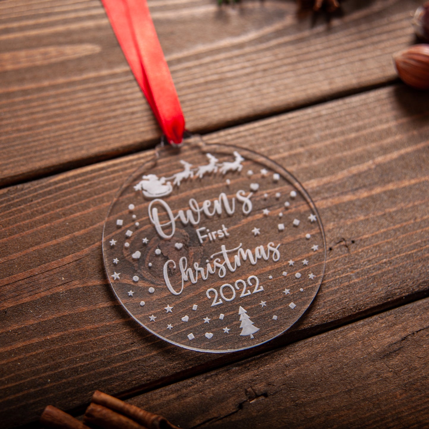Engraved baby’s first Christmas bauble with Santa and reindeer sleigh