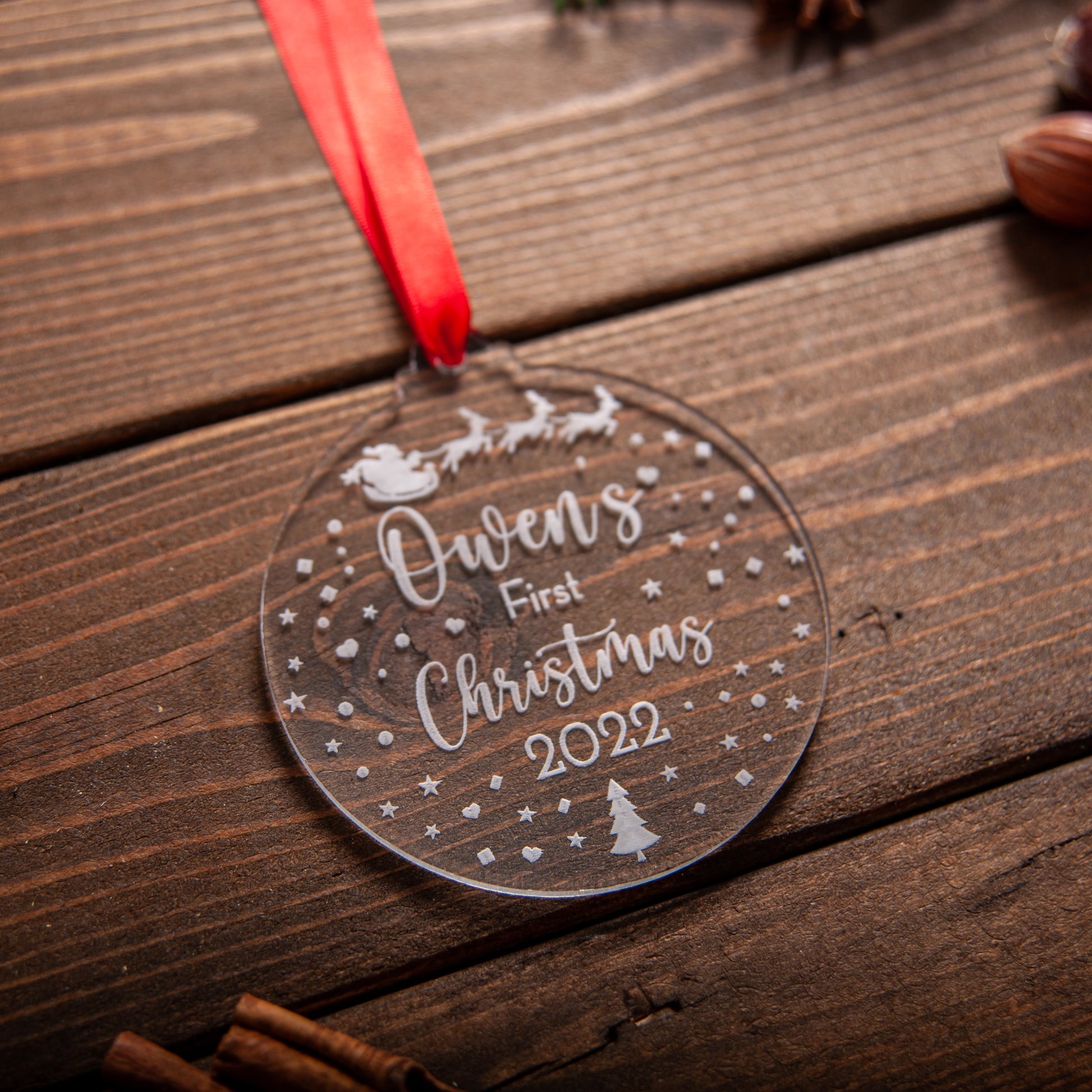Engraved baby’s first Christmas bauble with Santa and reindeer sleigh