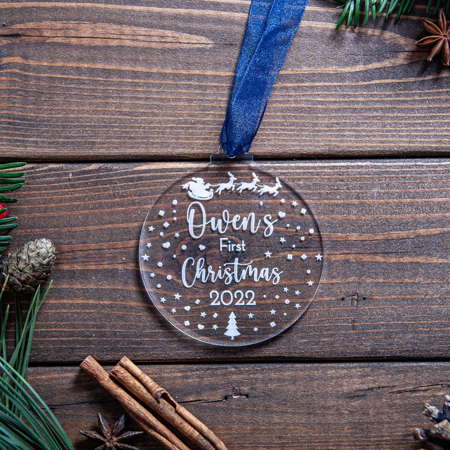 Personalised baby’s first Christmas ornament with engraved Santa and sleigh