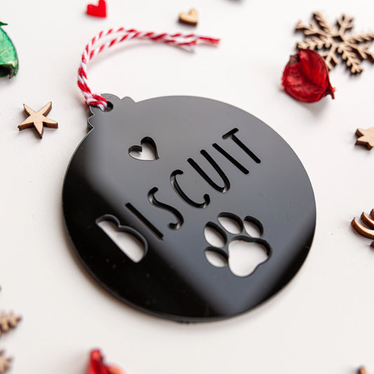 Custom pet name Christmas decoration in white acrylic with paw cut-out