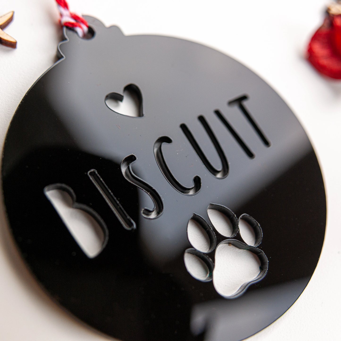 Engraved pet name bauble for animal lovers festive decoration