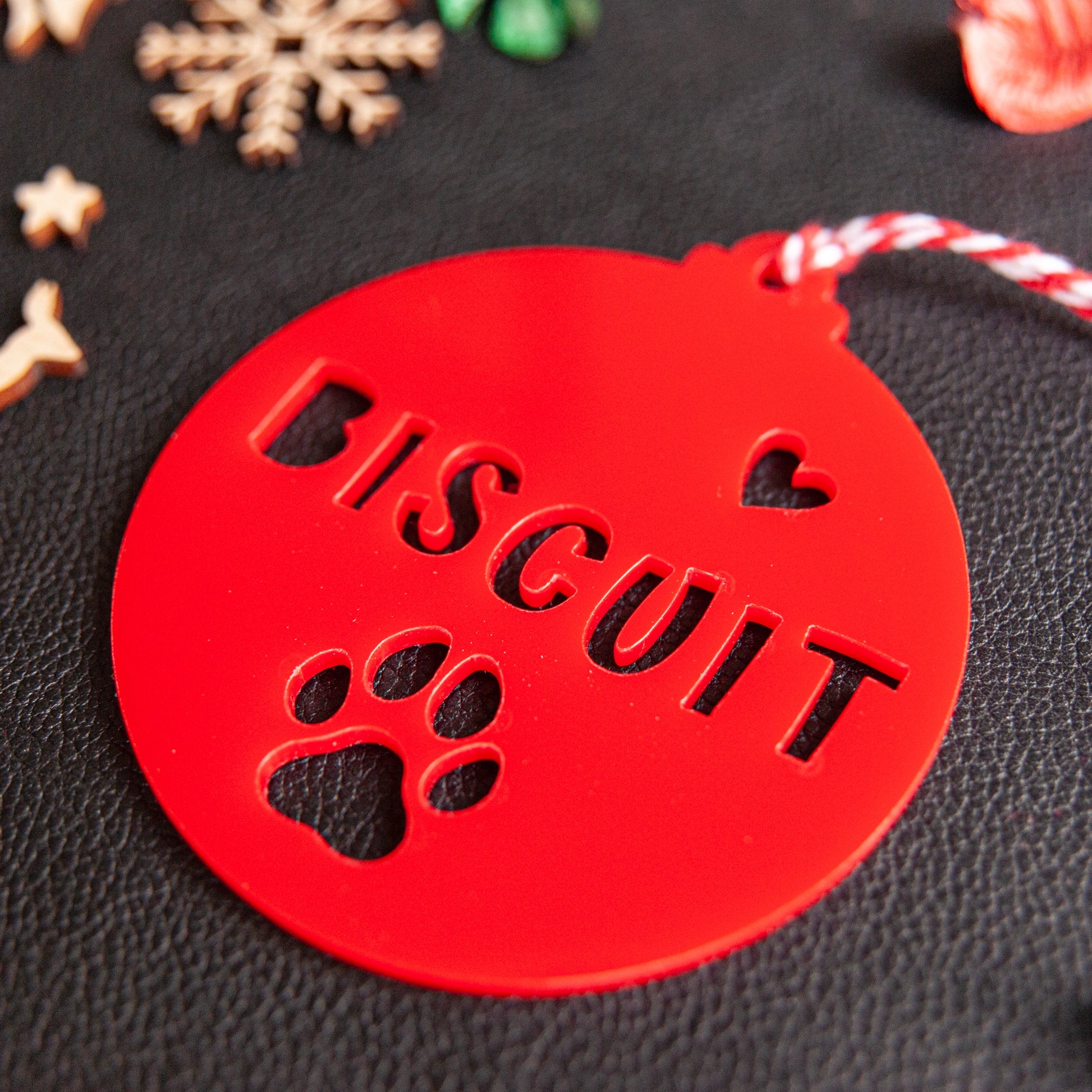 Engraved red paw ornament for dog or cat festive décor