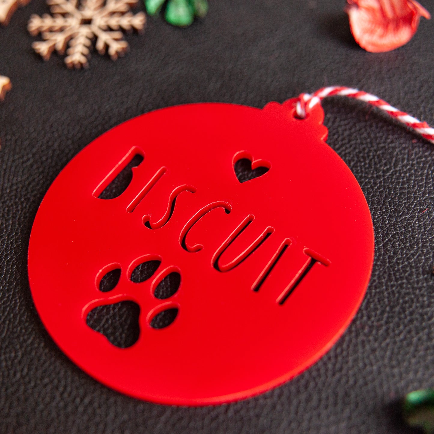 Custom red acrylic paw bauble for dog or cat Christmas gift