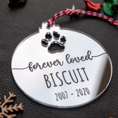 Personalised silver mirror remembrance ornament reflecting Christmas lights