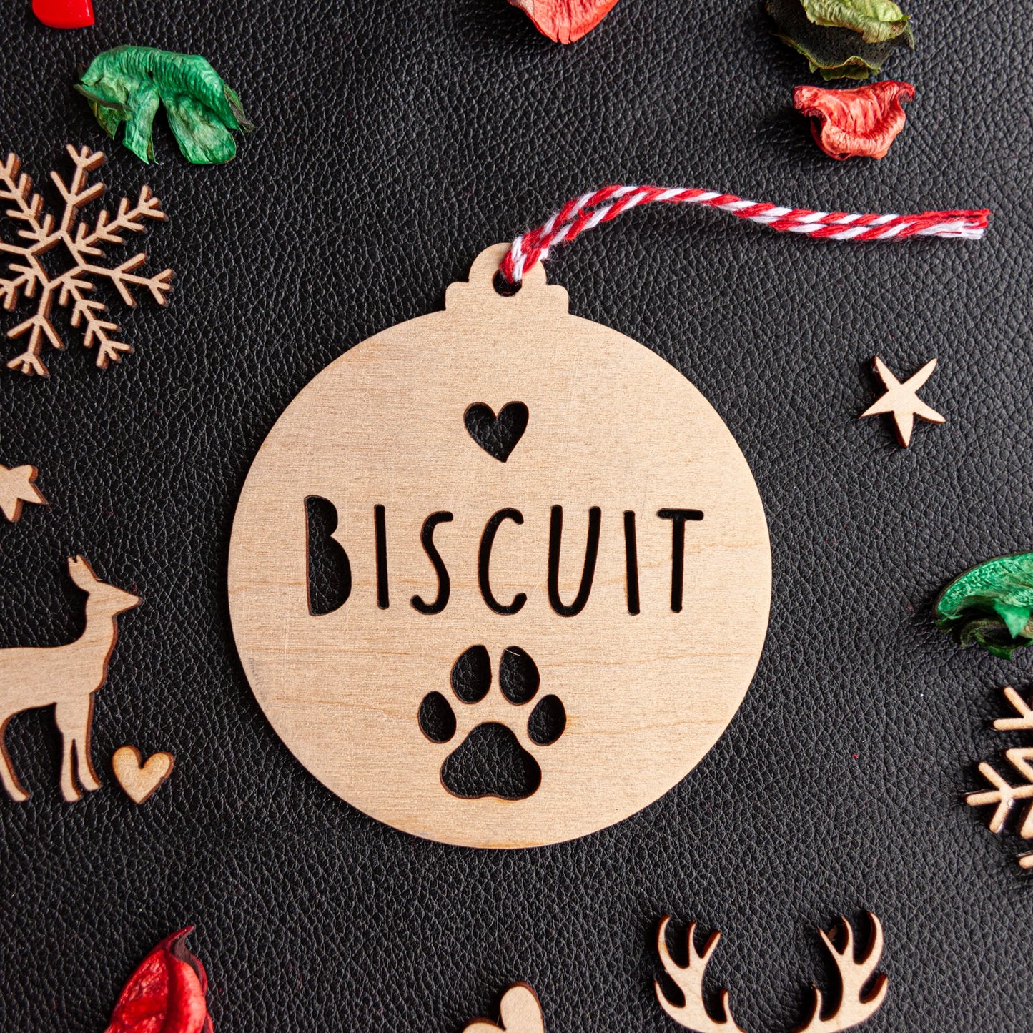 Custom wooden paw print ornament for festive pet décor