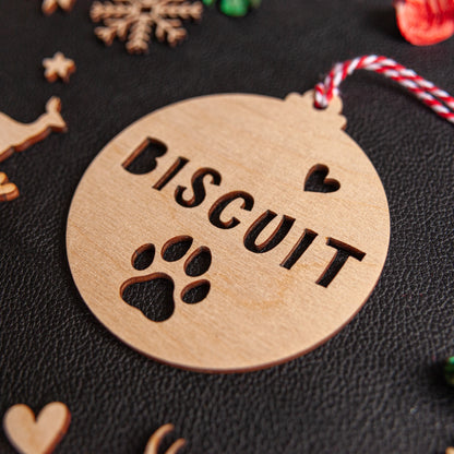 Engraved wooden paw bauble for dog or cat Christmas gift