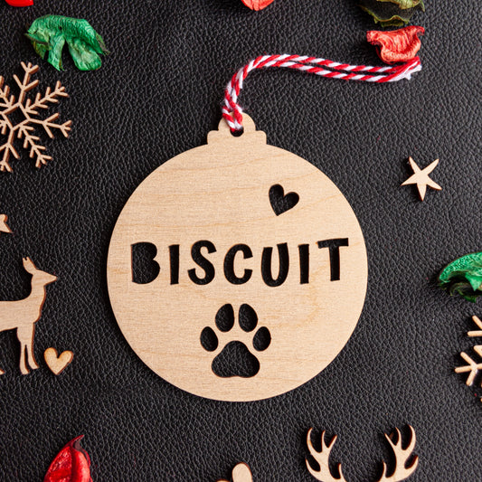Personalised wooden paw ornament with engraved pet name