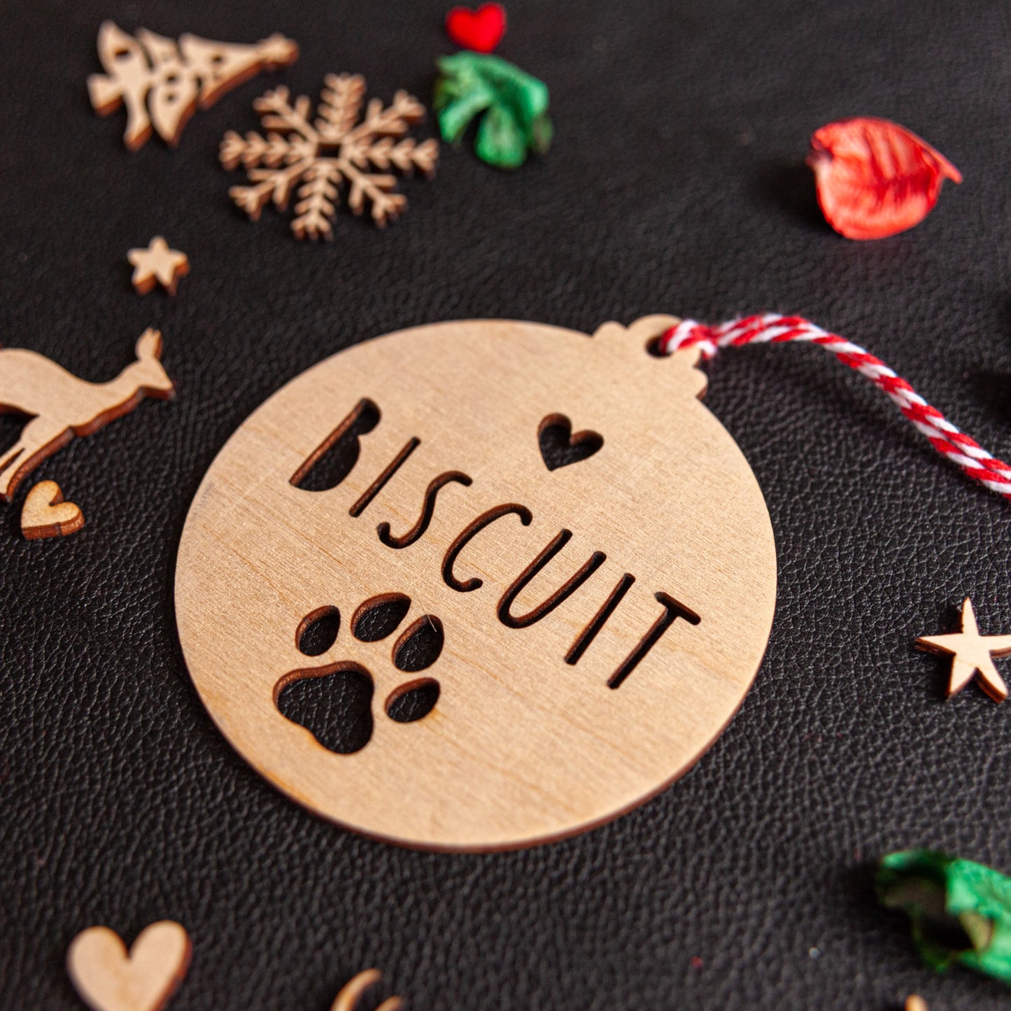 Rustic wood paw ornament engraved for pet memorial keepsake