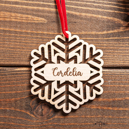 Rustic wooden Christmas bauble with twine ribbon ready to hang