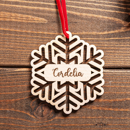 Rustic wooden Christmas bauble with twine ribbon ready to hang