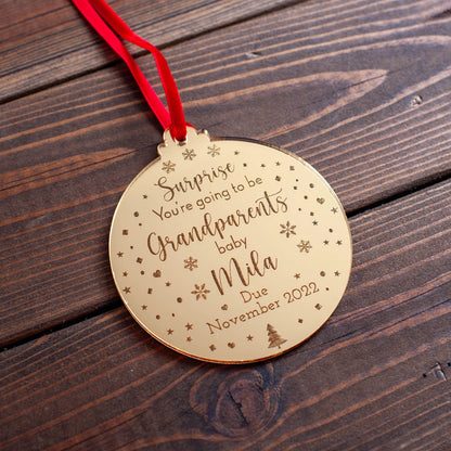 Personalised Christmas ornament revealing pregnancy news