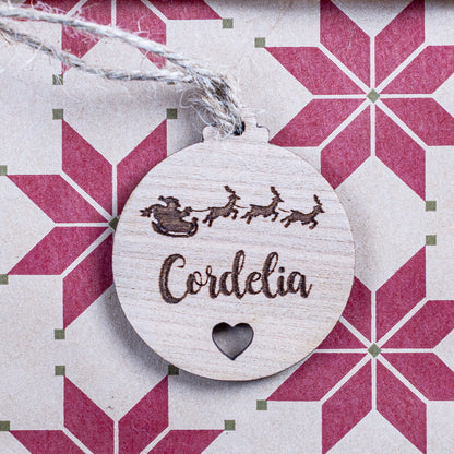 Personalised Christmas bauble gift tag with heart cut-out design
