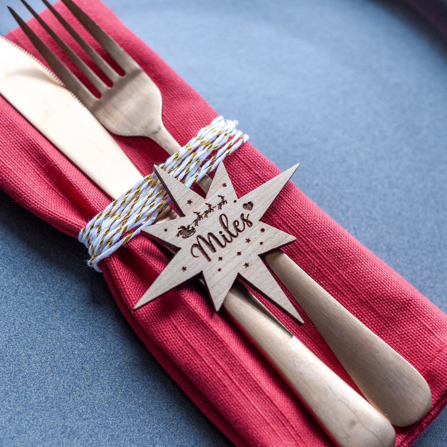 Laser cut Northern Star name tag in gold acrylic for festive dinner table