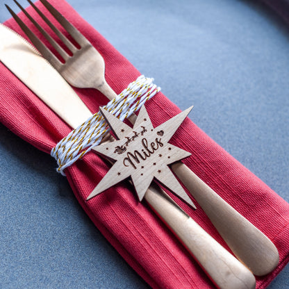 Laser cut Northern Star name tag in gold acrylic for festive dinner table