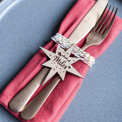 Elegant Northern Star laser cut place name for winter wedding or festive dinner