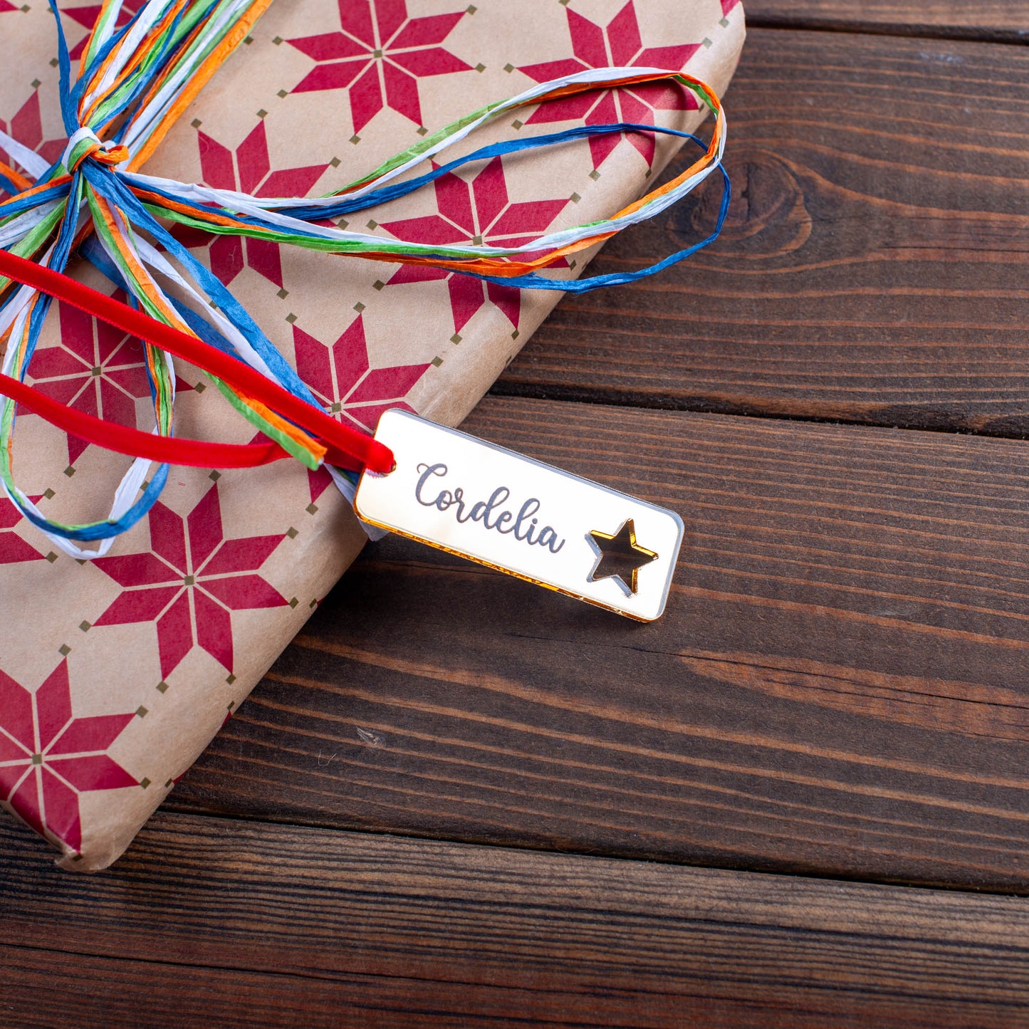 Rustic personalised wood tag with festive ornament cut-out pattern