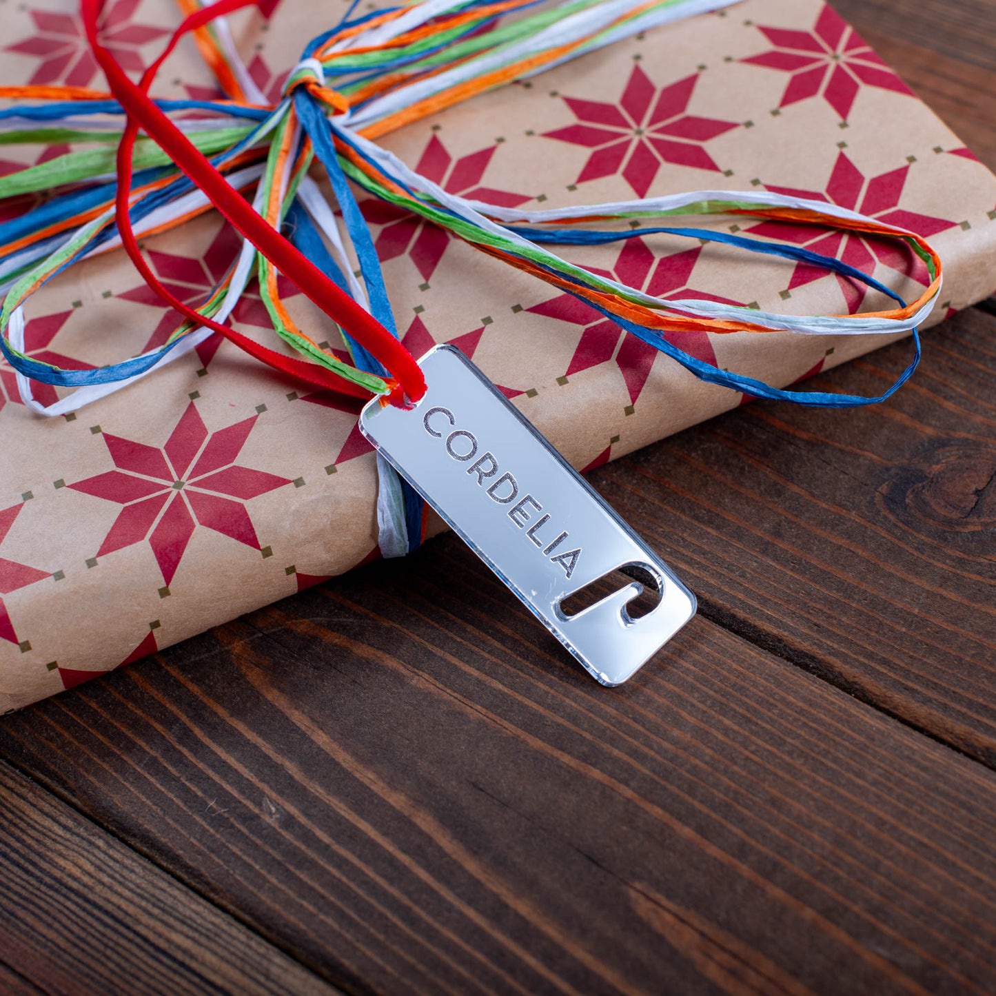 Laser cut personalised wooden Christmas tag for festive holiday gifts candy cane design