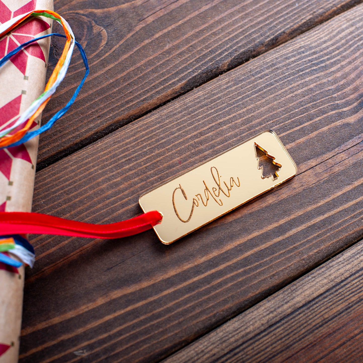 Laser cut wooden rectangle tag featuring festive ornament details