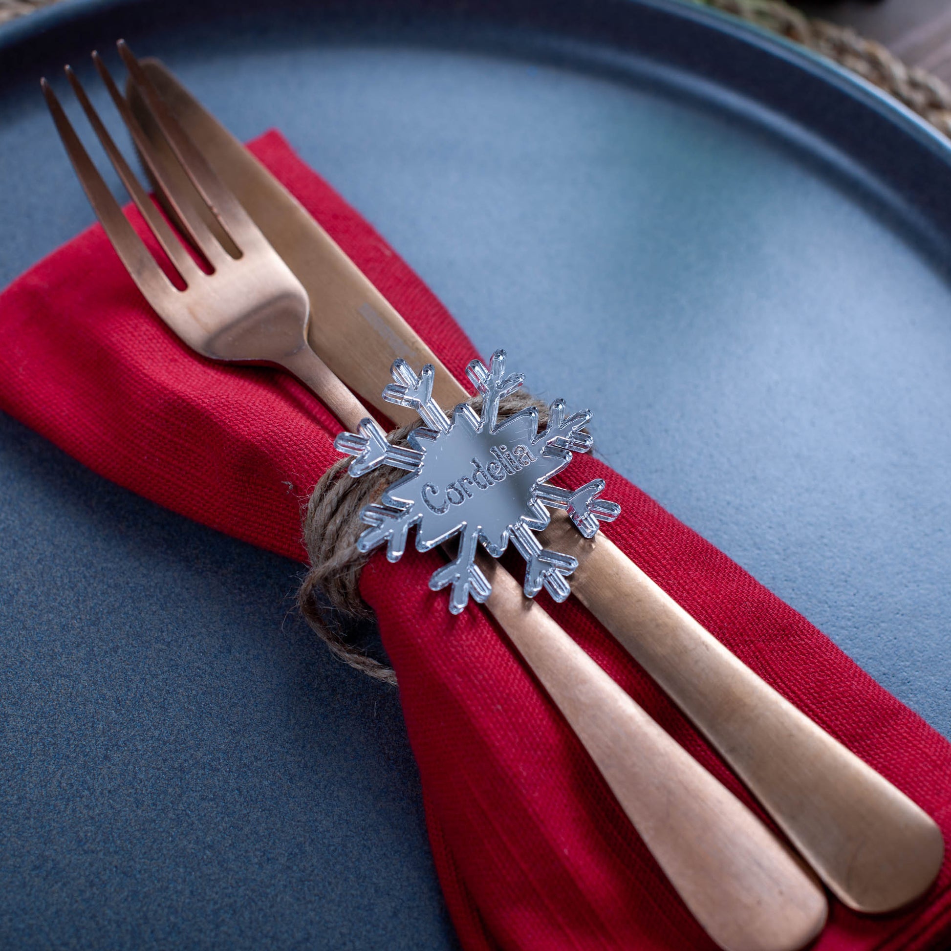 Handmade snowflake-shaped place name for winter holiday table