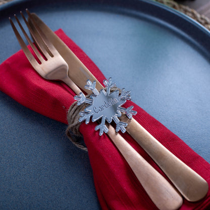 Handmade snowflake-shaped place name for winter holiday table