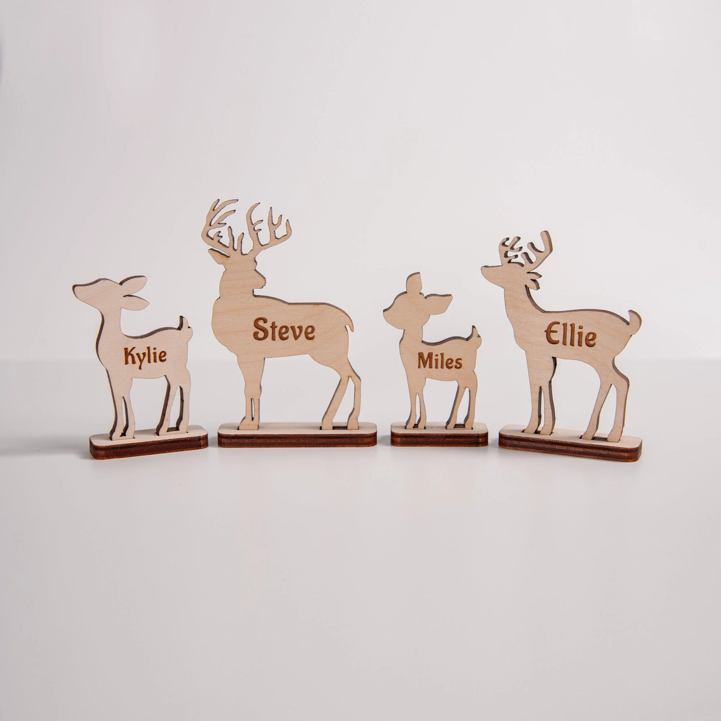 Wooden reindeer name tag decoration for festive dinner table