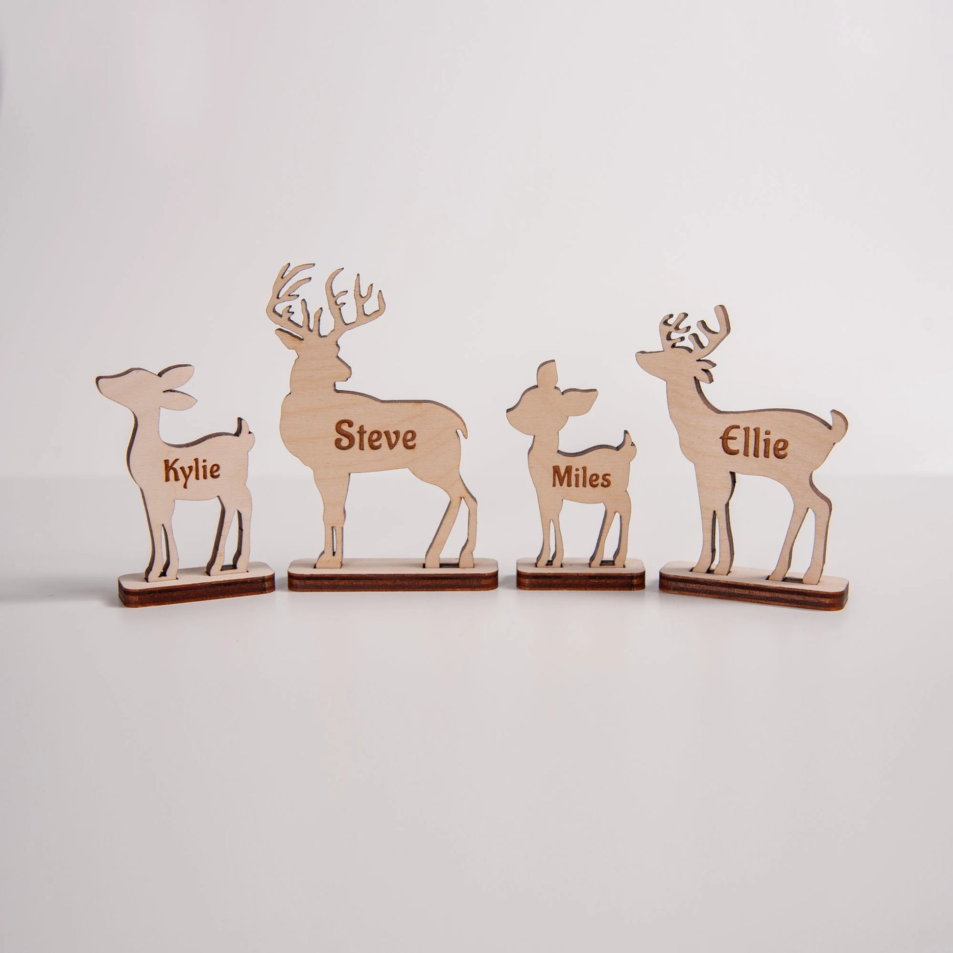Wooden reindeer name tag decoration for festive dinner table