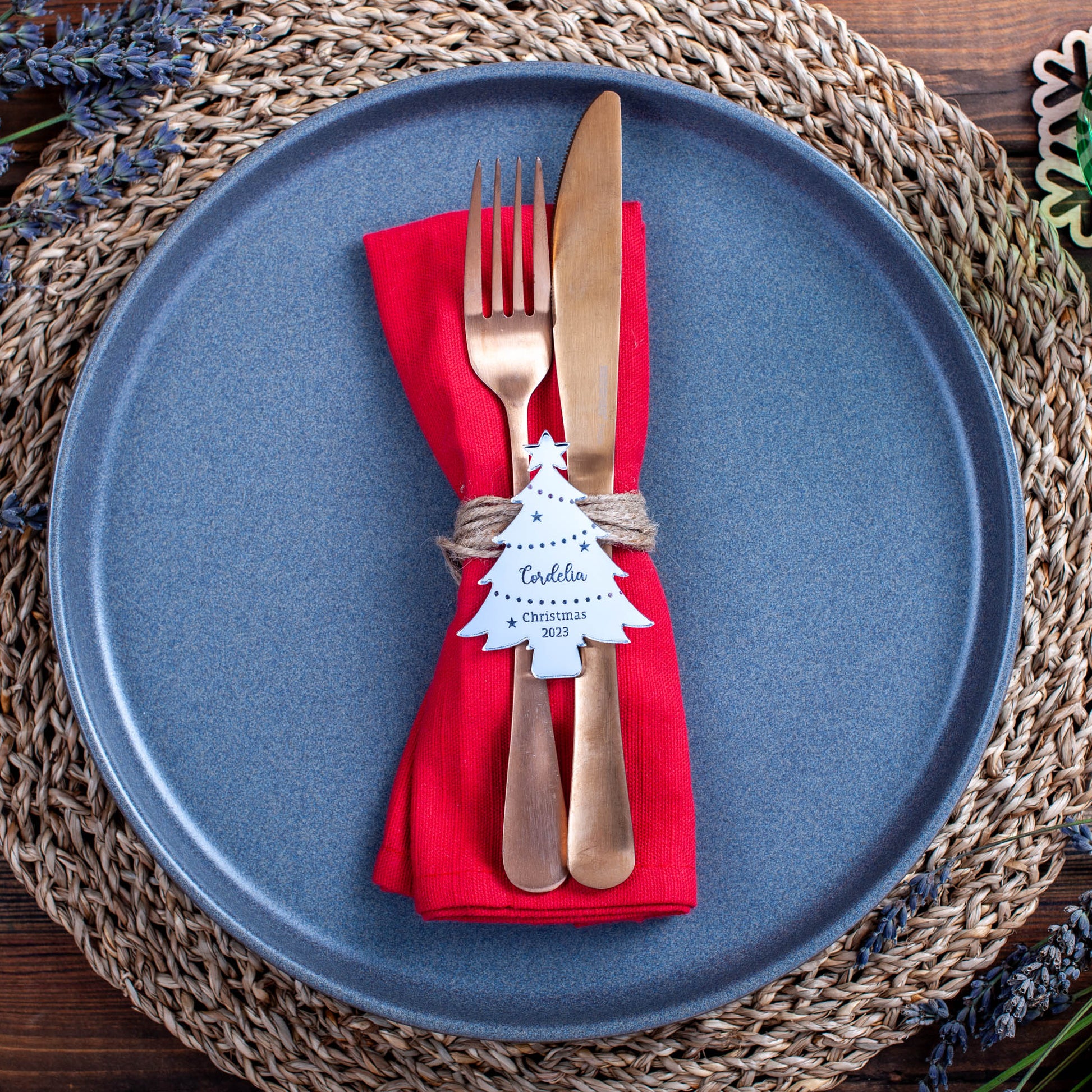 silver mirror Christmas table setting with personalised name decoration in tree shape