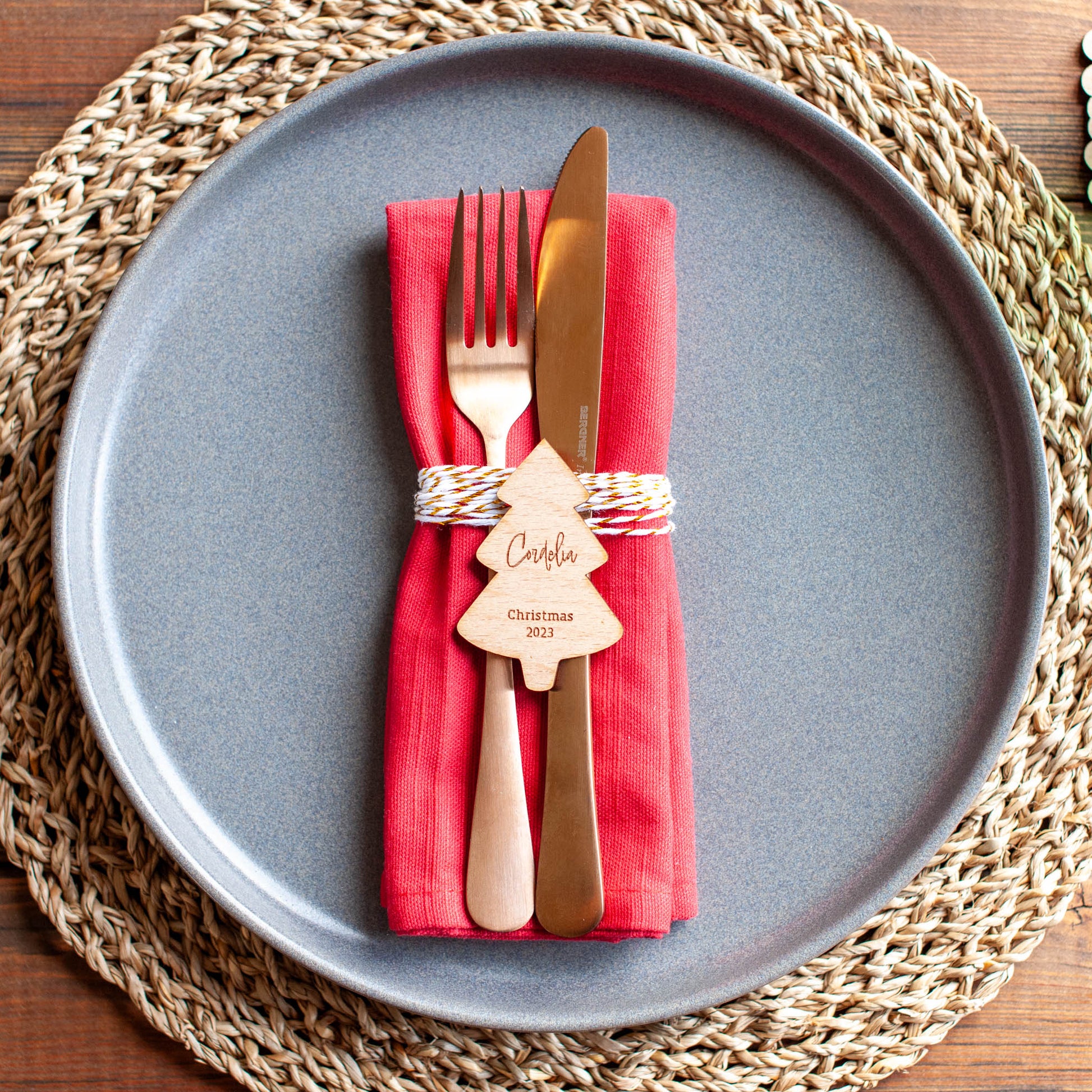 Children’s Christmas place setting featuring engraved wooden name tag