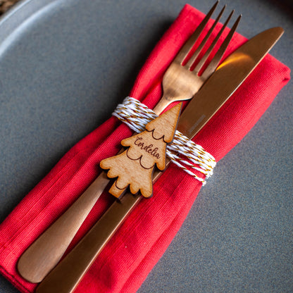 Elegant Christmas tree shaped place card on holiday table setting