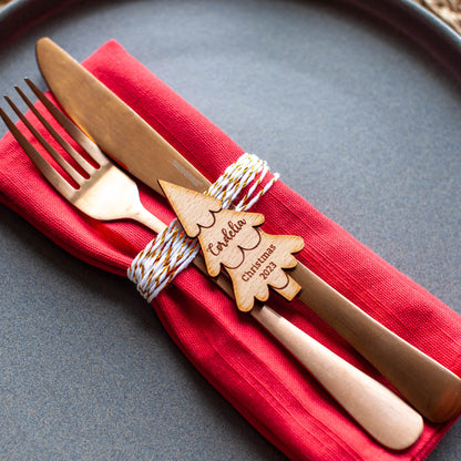 Minimalist Christmas table setup with personalised name tag in tree shape
