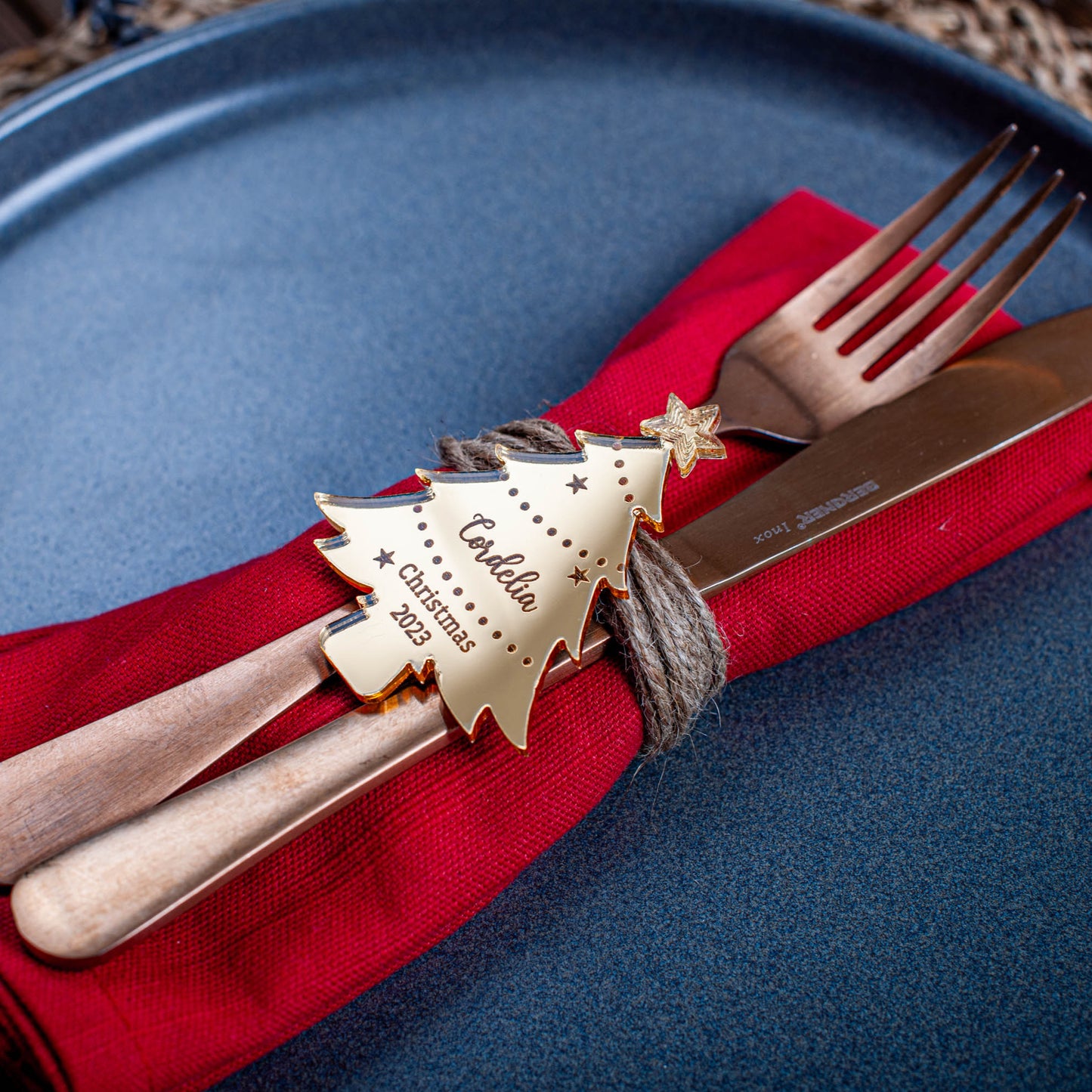 Festive Christmas dinner table decorated with custom Gold Mirror Acrylic name place cards