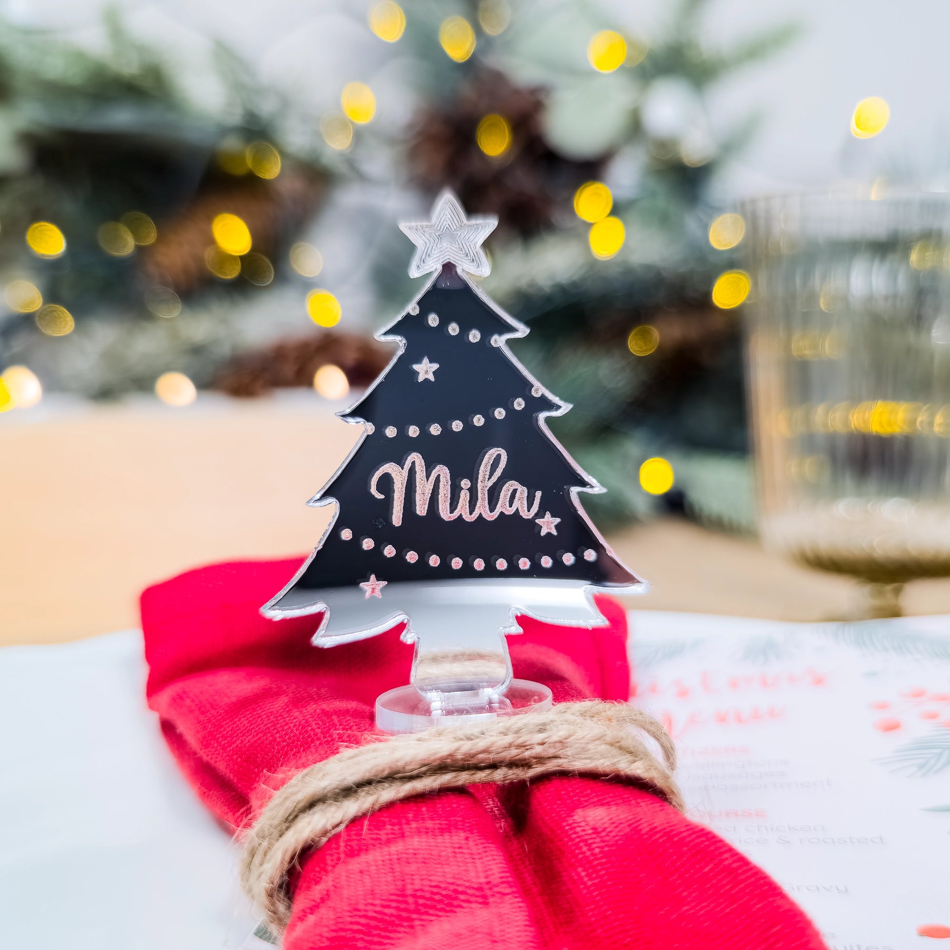 Silver mirror tree place setting engraved with guest’s name