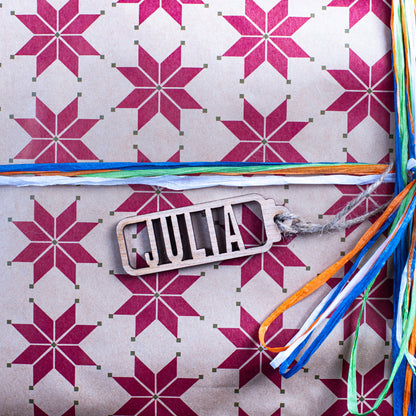 Custom cut-out wooden Christmas tag with personalised name