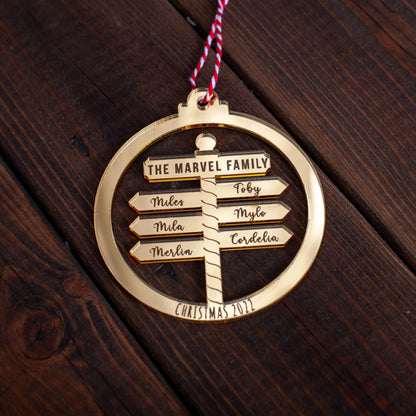Custom family Christmas bauble engraved with North Pole Post design