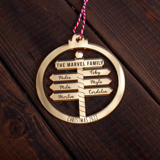 Custom family Christmas bauble engraved with North Pole Post design