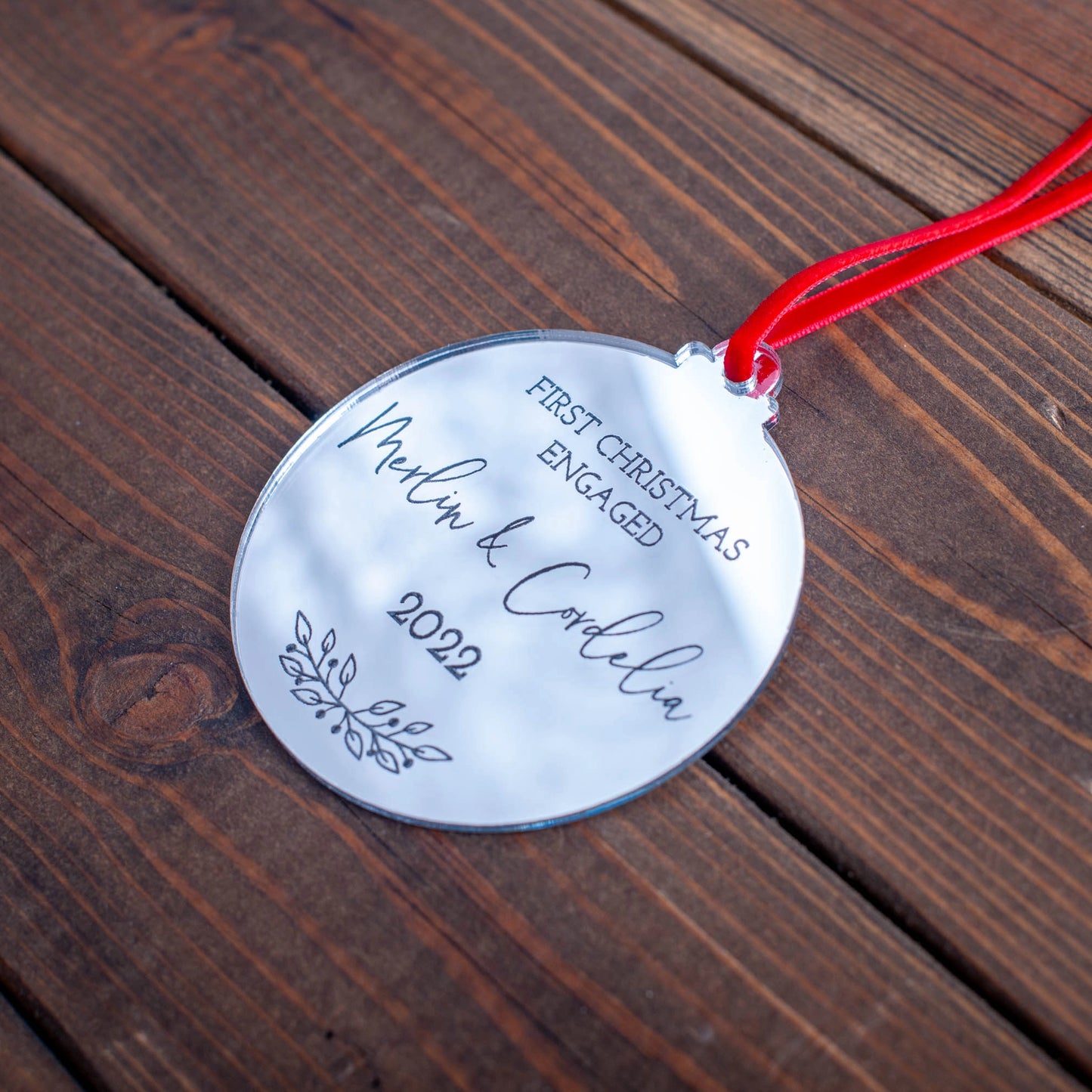 Reflective silver mirror ornament engraved for engaged couple