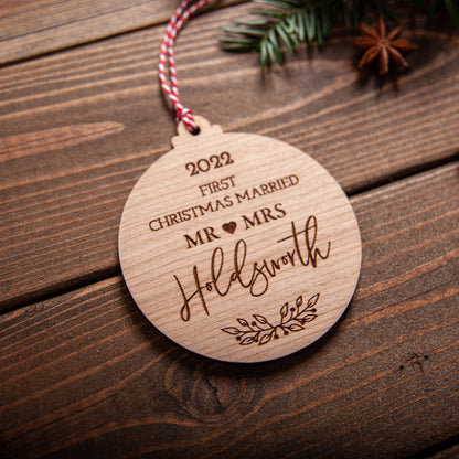 Personalised first Christmas married engraved wooden bauble ornament