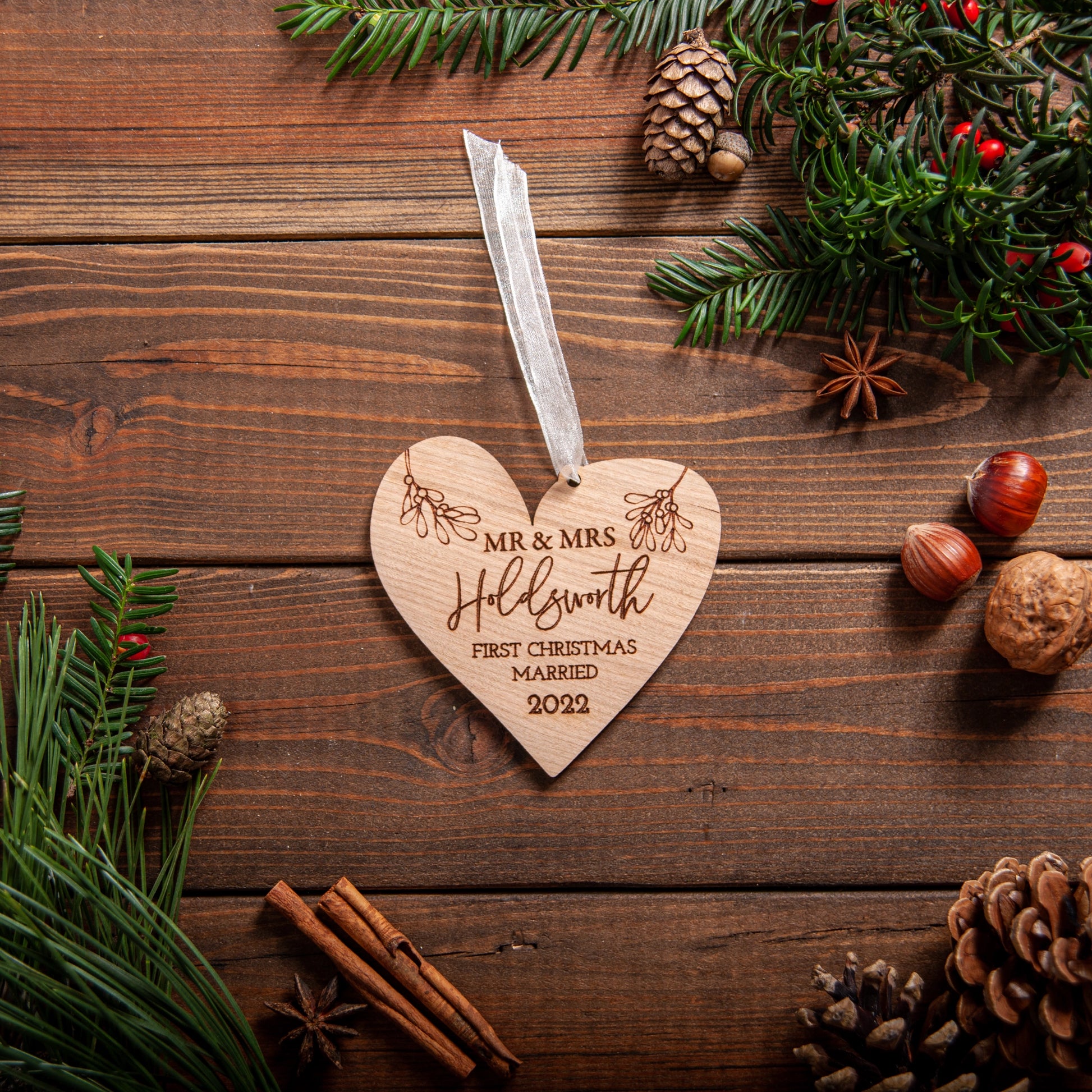 Engraved acrylic heart ornament gift for married couple’s first Christmas