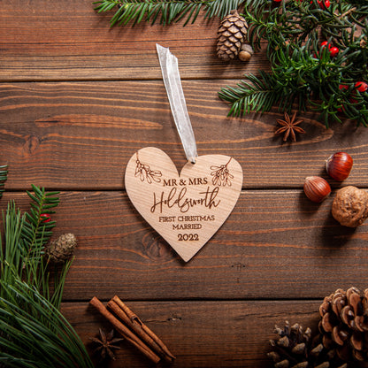 Engraved acrylic heart ornament gift for married couple’s first Christmas