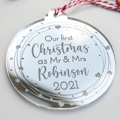 Reflective silver acrylic ornament engraved with couple’s names and year