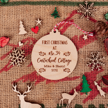 Wooden new home bauble with laser engraving