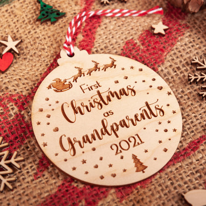 Personalised first Christmas as grandparents engraved wooden bauble