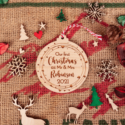 Personalised Mr and Mrs Christmas bauble engraved on natural wood