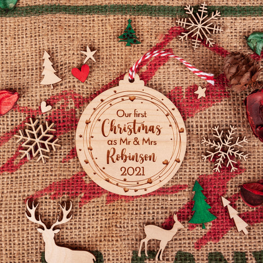 Personalised Mr and Mrs Christmas bauble engraved on natural wood