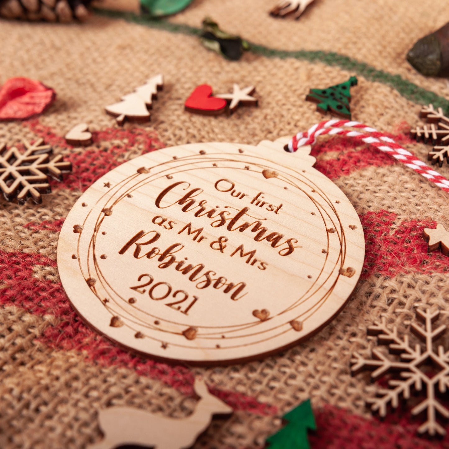 Rustic engraved bauble for first Christmas as Mr and Mrs